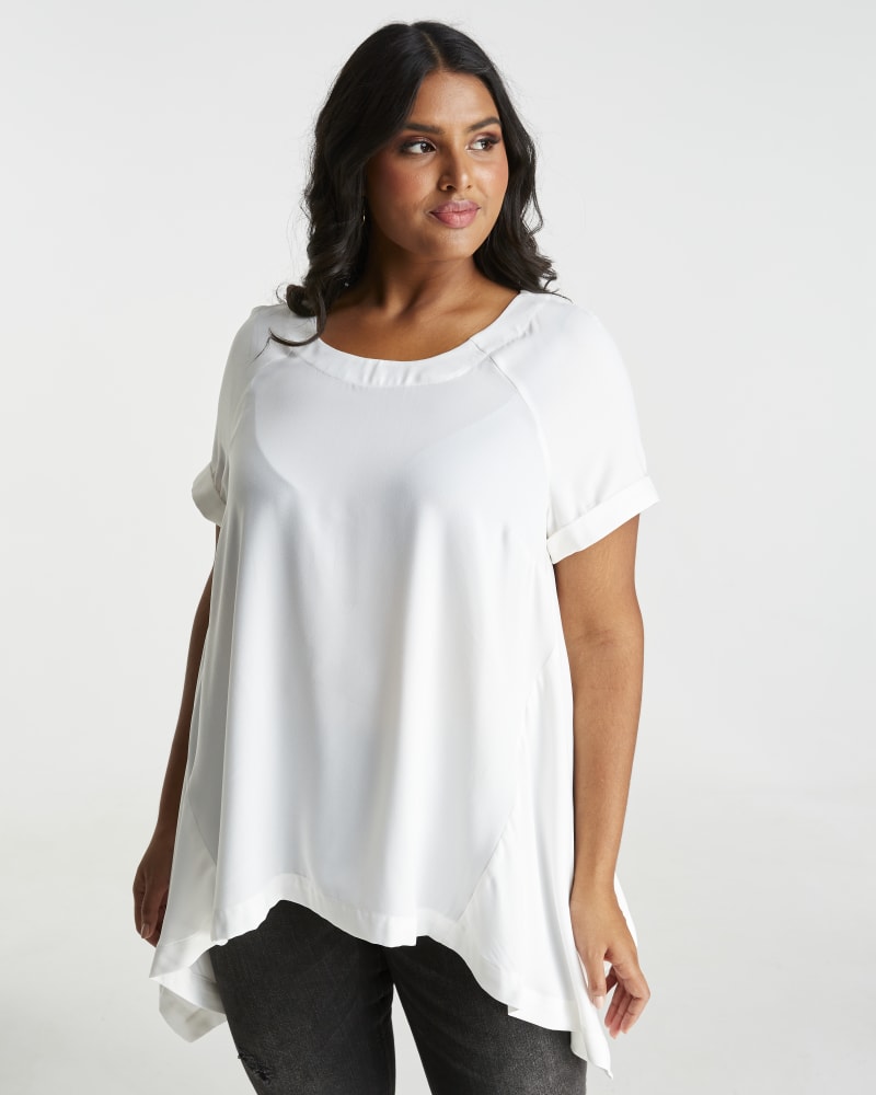 Front of a model wearing a size 1X Cora Top in Milk by Estelle. | dia_product_style_image_id:248443